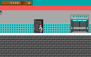 Dangerous Dave standing in a hospital corridor aiming his shotgun at enemies