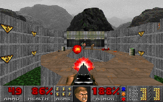 A dark corridor in DOOM with acidic sludge and locked doors