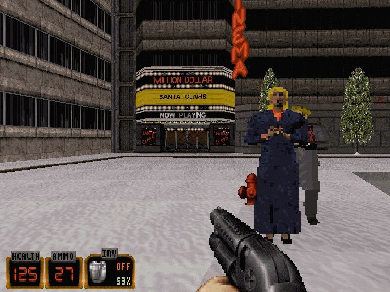 Duke Nukem fighting festive themed enemies in snowy environment