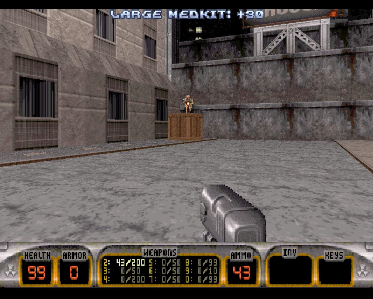 Duke Nukem fighting enemies in a city level