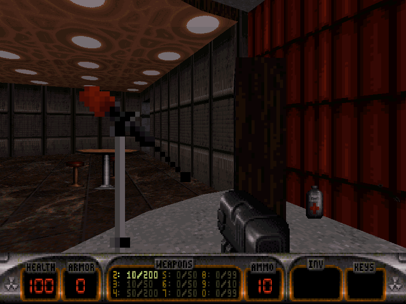 First-person view of a heavily populated room full of alien monsters