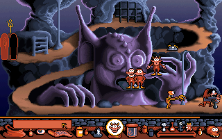 Three goblins standing on a grassy single-screen stage with interactive objects