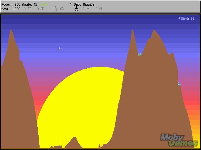 Scorched Earth gameplay showing colorful 2D terrain and trajectory lines