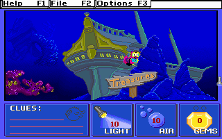 Super Seeker swimming underwater with a flashlight and bubble pump